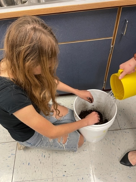 Adding water to soil